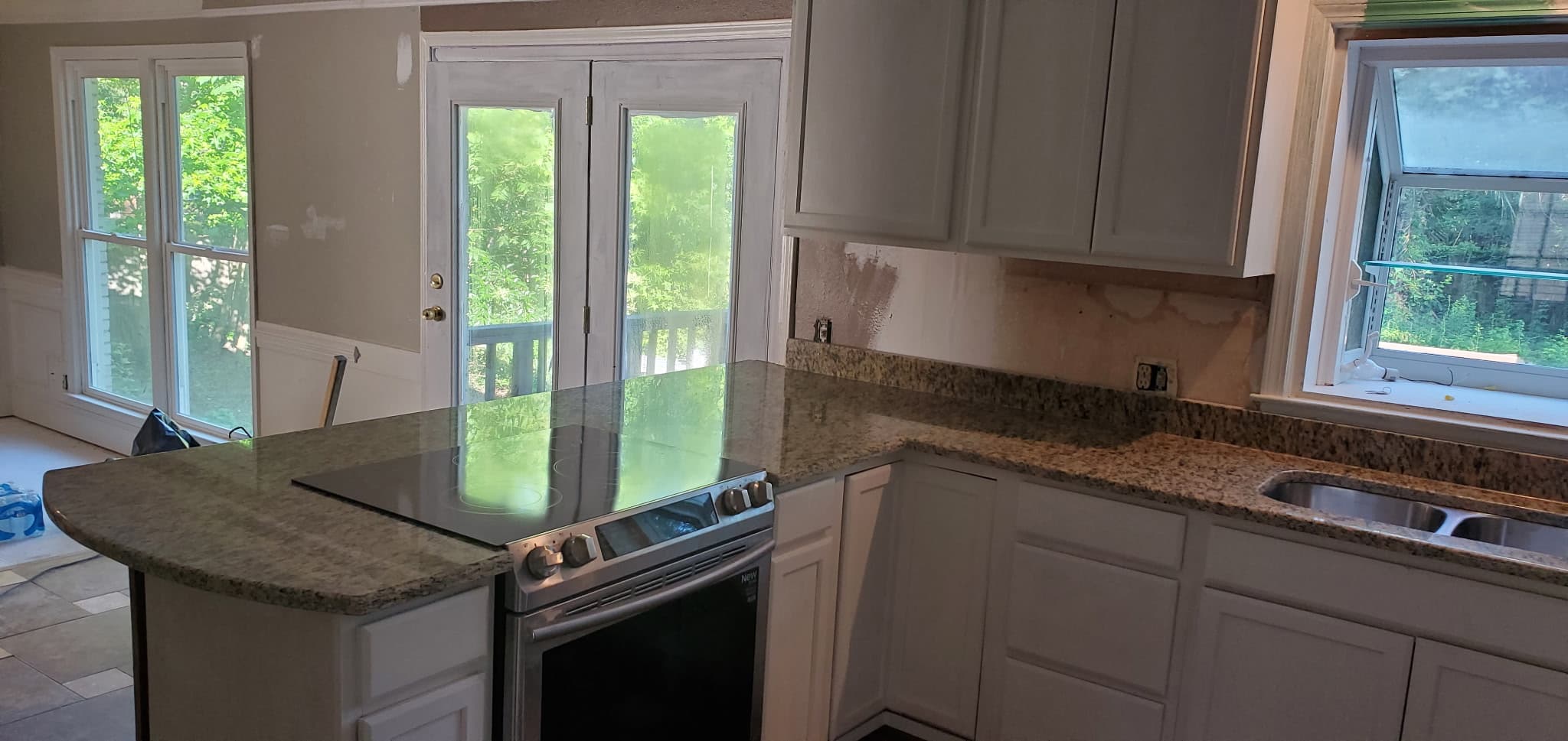 Marble island paired with gold granite perimeter counters